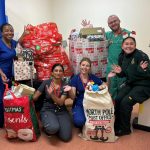 Featured image for Santa’s little helpers: Paramedics gift hundreds of Christmas presents to sick children